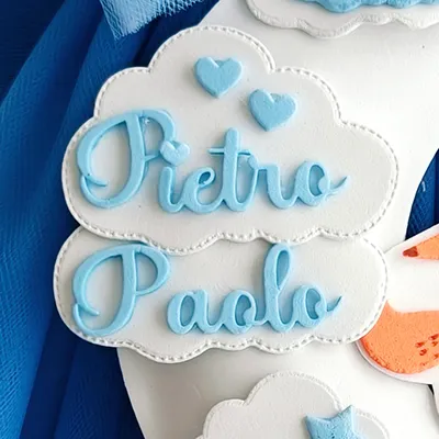 Scritta in corsivo con il nome Pietro Paolo per fiocco di nascita.